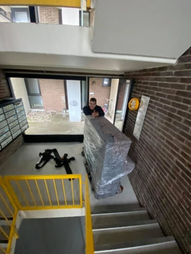 Flytning af klaver i Odense